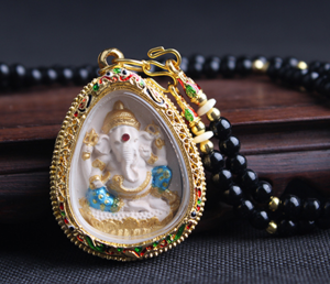 泰国佛牌原庙龙婆垦开光 银色四面佛的招财求子与助生意之奥秘